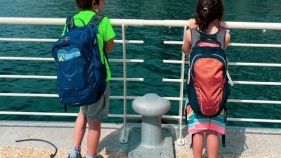 kids waiting to board boat