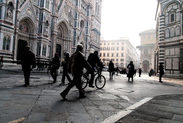 person on bike in Florence city center