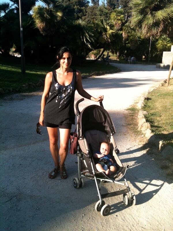Mom in Italy with baby on stroller