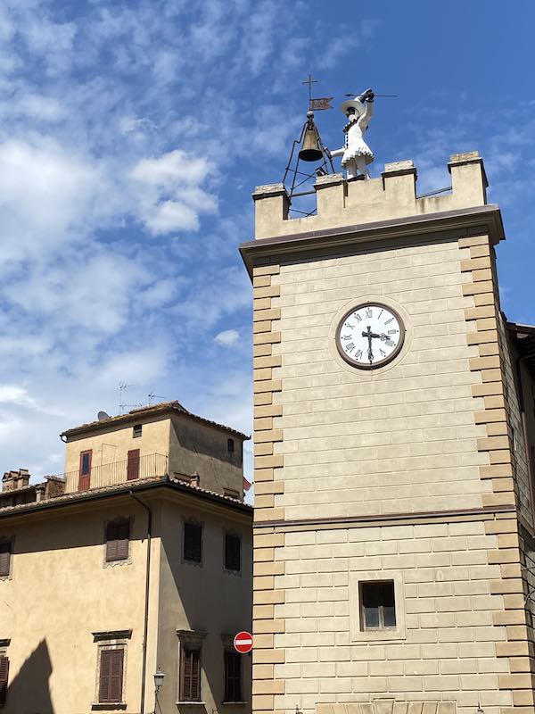 Montepulciano tower with Pulcinella