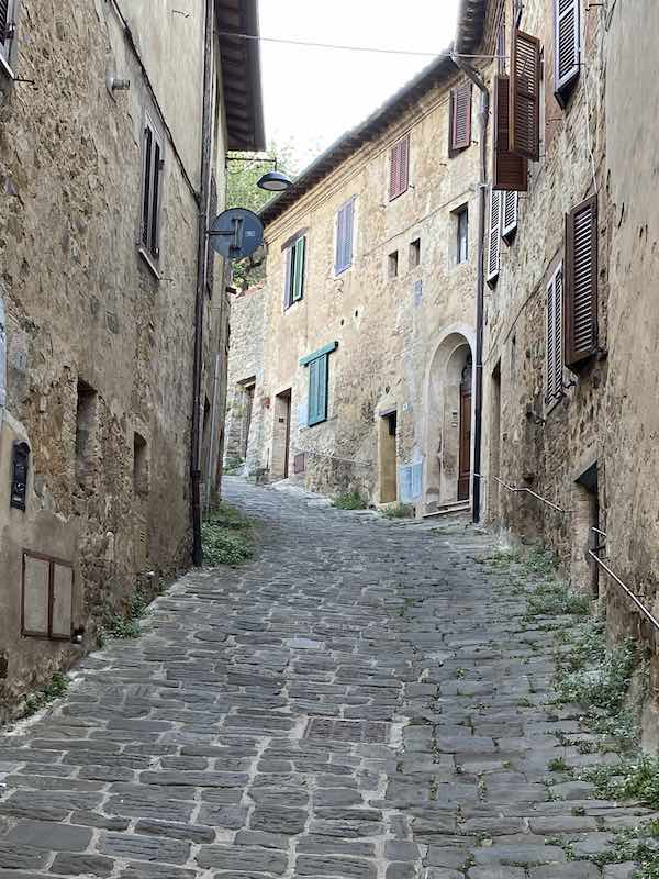 steep, cobbled street in Montalcino, Tuscany