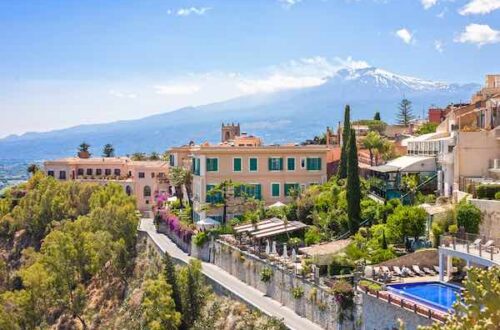 One day in Taormina cover image: city view with Mount Etna in the backgroud