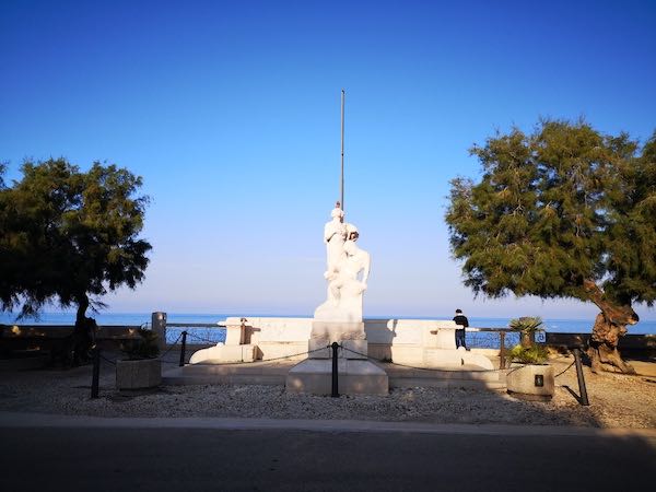 Trani gardens overlooking the sea with statue