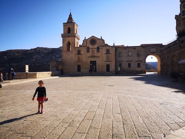 Child in piazza in Matera Italy