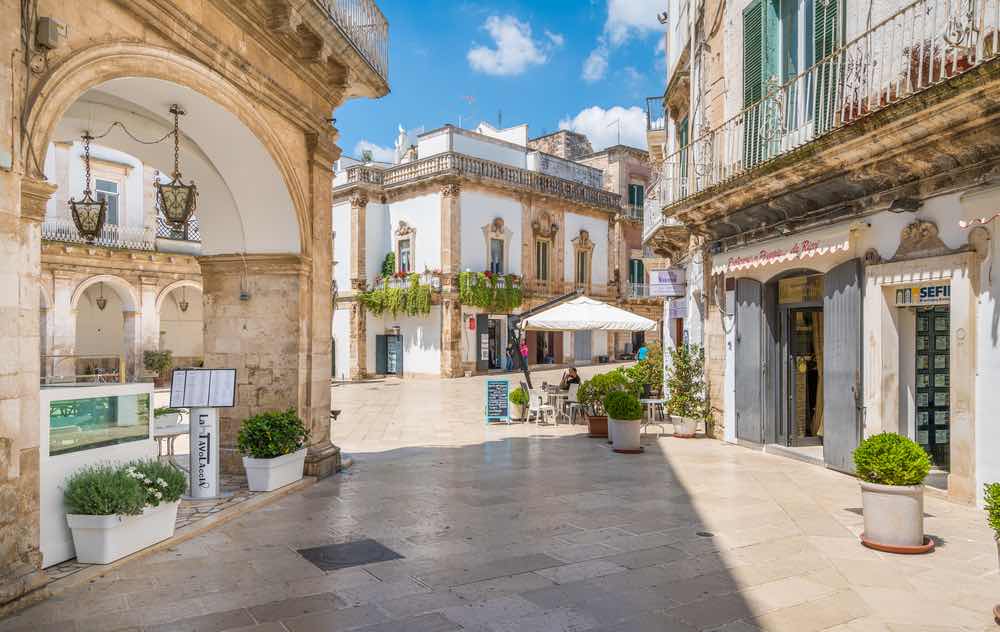 Street in Martina Franca Puglia with traditional white architecture