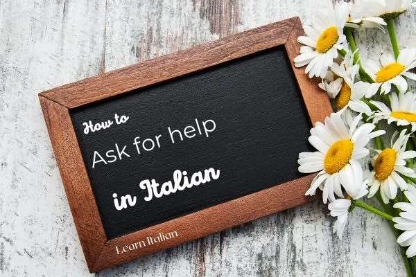 Blackboard with writing: how to ask for help in Italian