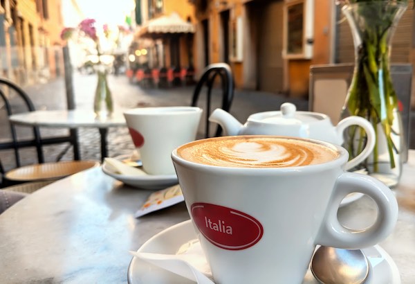 cup of cappuccino in outdoor cafe in italy