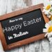 blackboard with daysies and text: How to say happy Easter in Italian, learn Italian