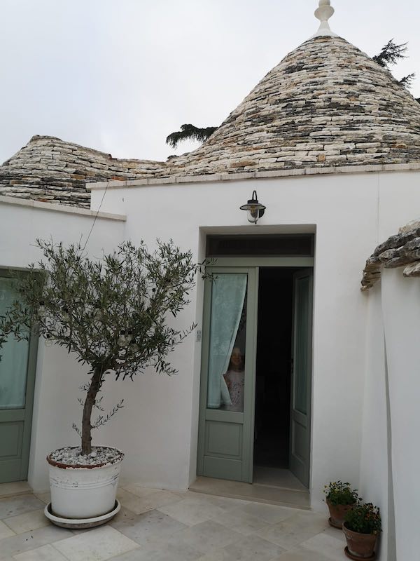 My daughter in our accommodation in a trullo in Puglia