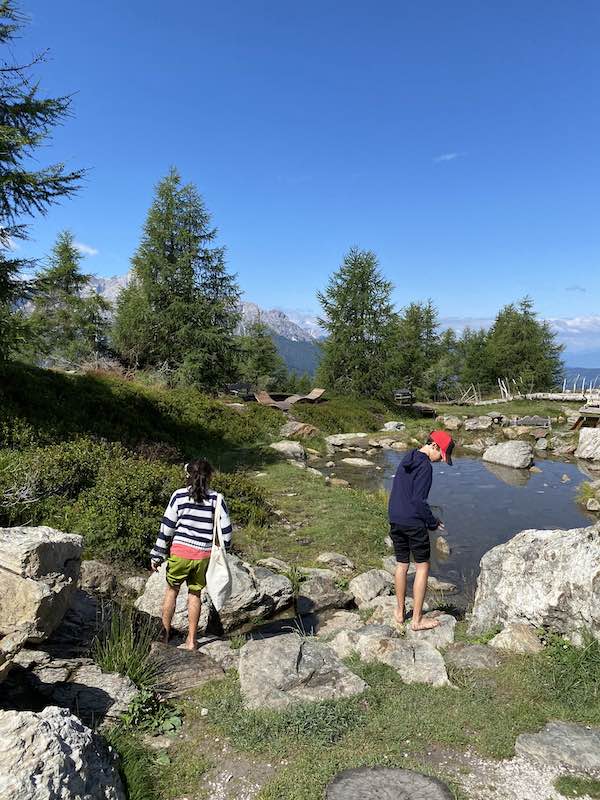 Our kids on the barefoot trail in Olperl Park in Sesto-Sexten