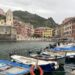 Small harbor of Vernazza Italy with colorful wooden boats