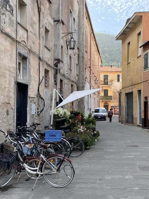 Bikes parked on a street in Levanto Italy
