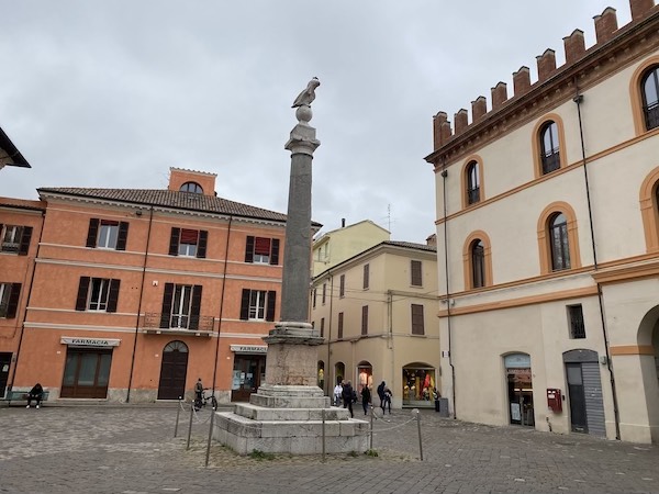 Cute pedestrian piazza in Ravenna with column in the center