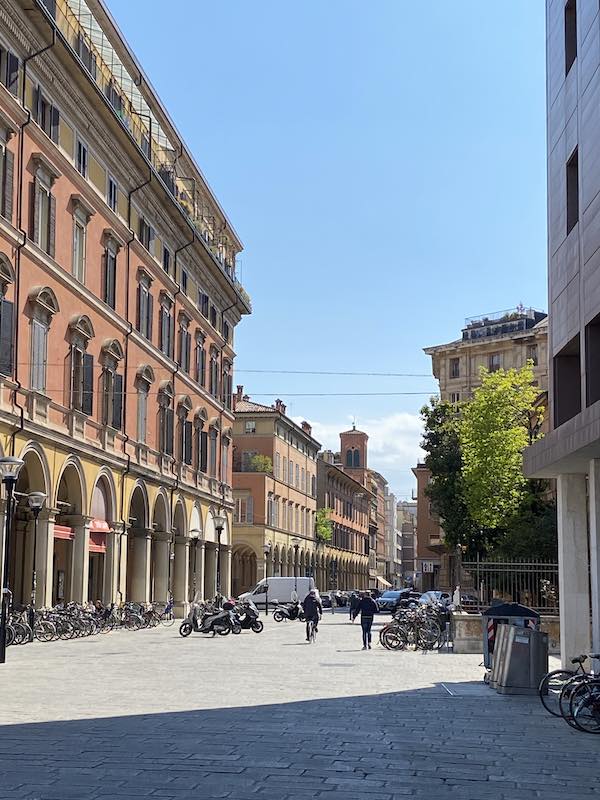 Porticoes and bikes in Bologna City center, Italy 