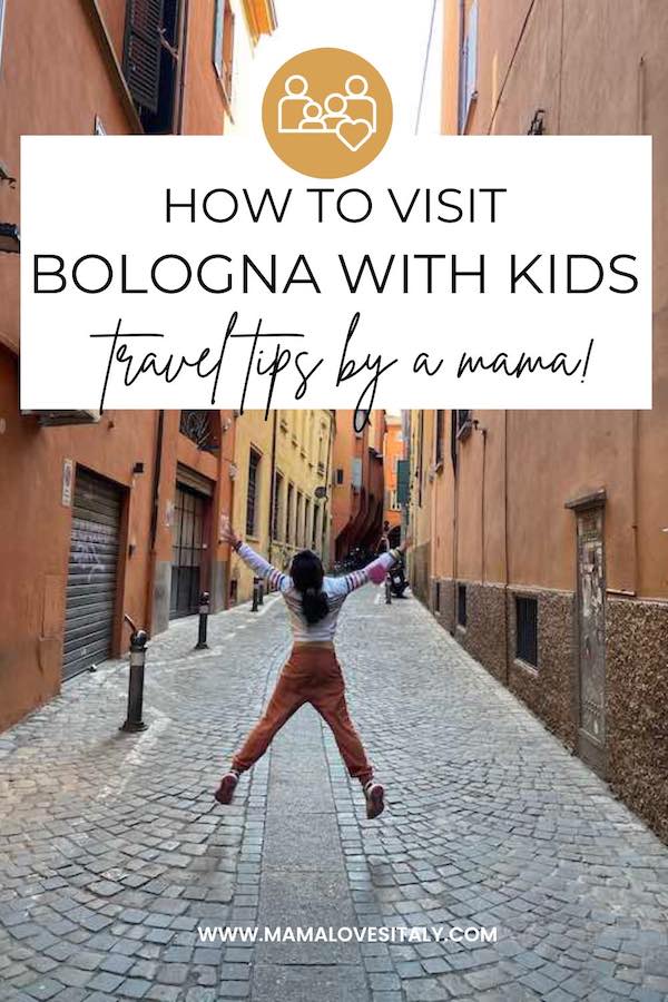 Image for Pinterest: girl jumping in a city center street in Bologna, with text: how to visit Bologna with kids, travel tips by a a mama