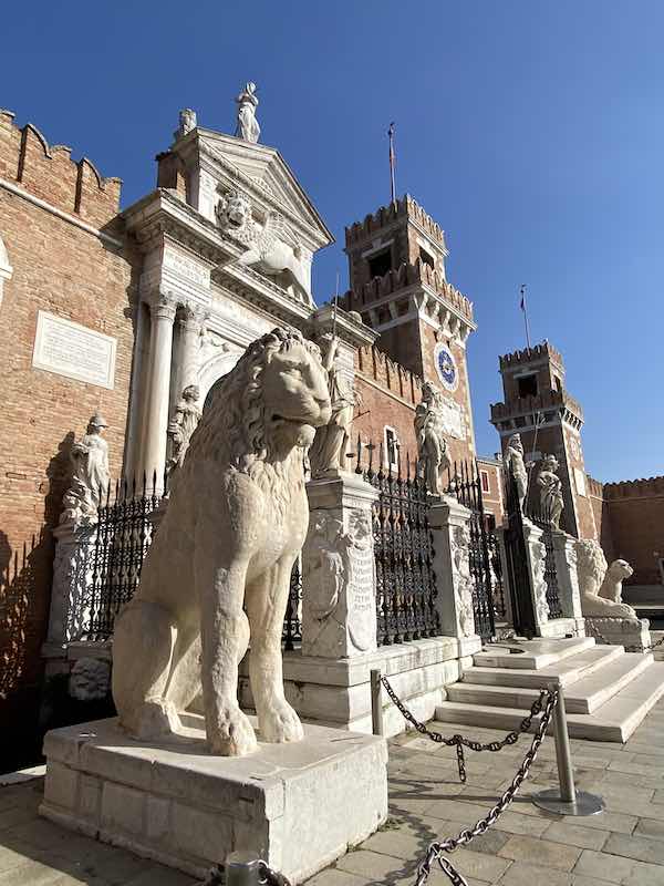 Arsenale in venice with huge statue of a lion