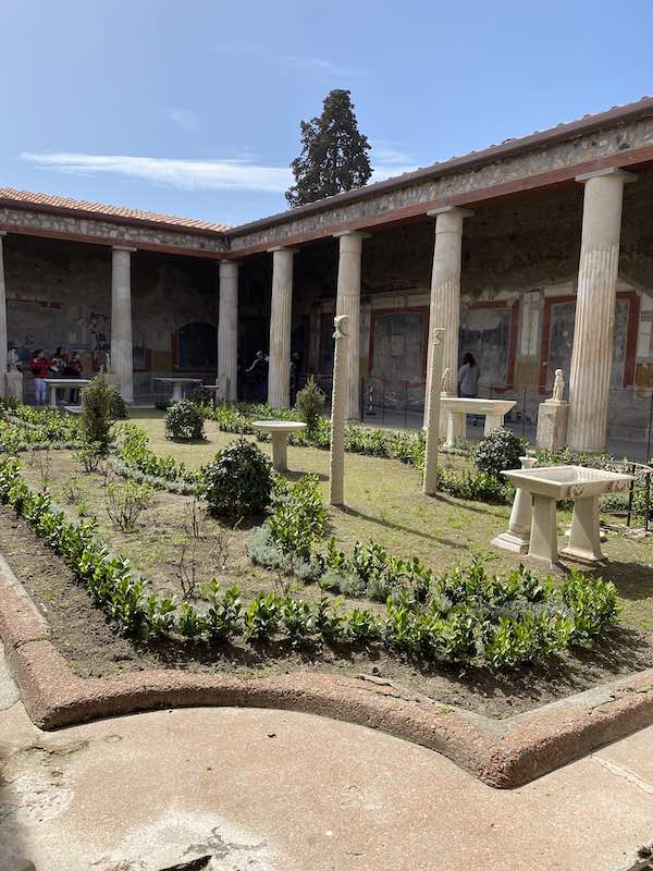 Courtyard of the beautiful and anciet casa dei Vettii in Pompeii 