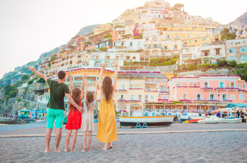 family in positano italy in summer