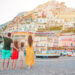 family in positano italy in summer