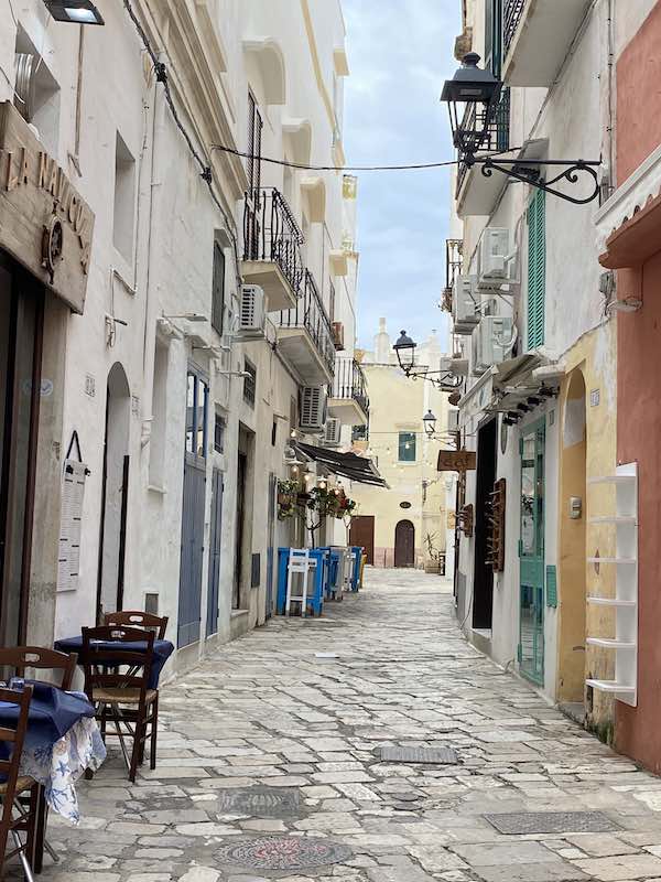 Pretty street in Gallipoli with outdoor tables
