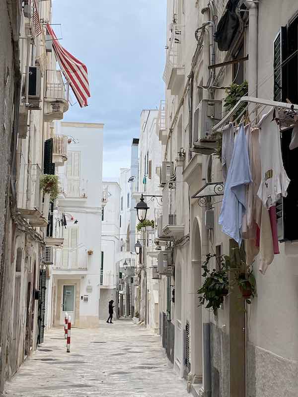 Street in Monopoli with hanging laundry