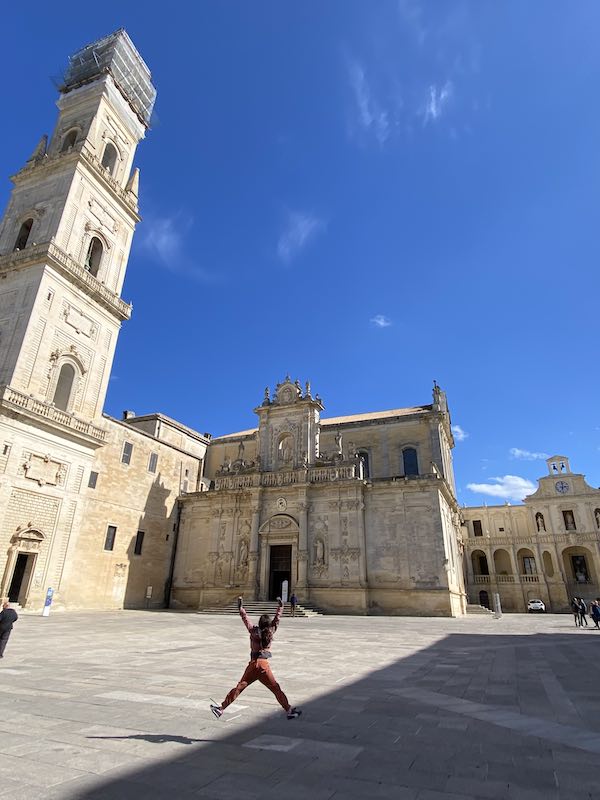 My daugher in Lecce jumping in front of the duomo