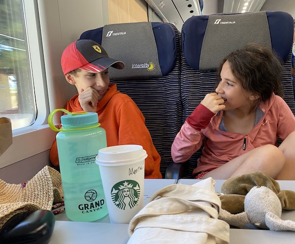 These are my kids on a second class carriage of the intercity Rome - Tropea