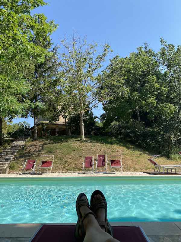 Me at the pool of our agritirismo in Umbria